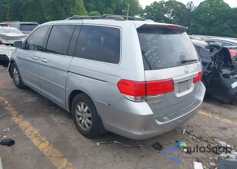 2010 Honda Odyssey Ex-L z USA, uszkodzony, nr VIN 5FNRL3H78AB036216